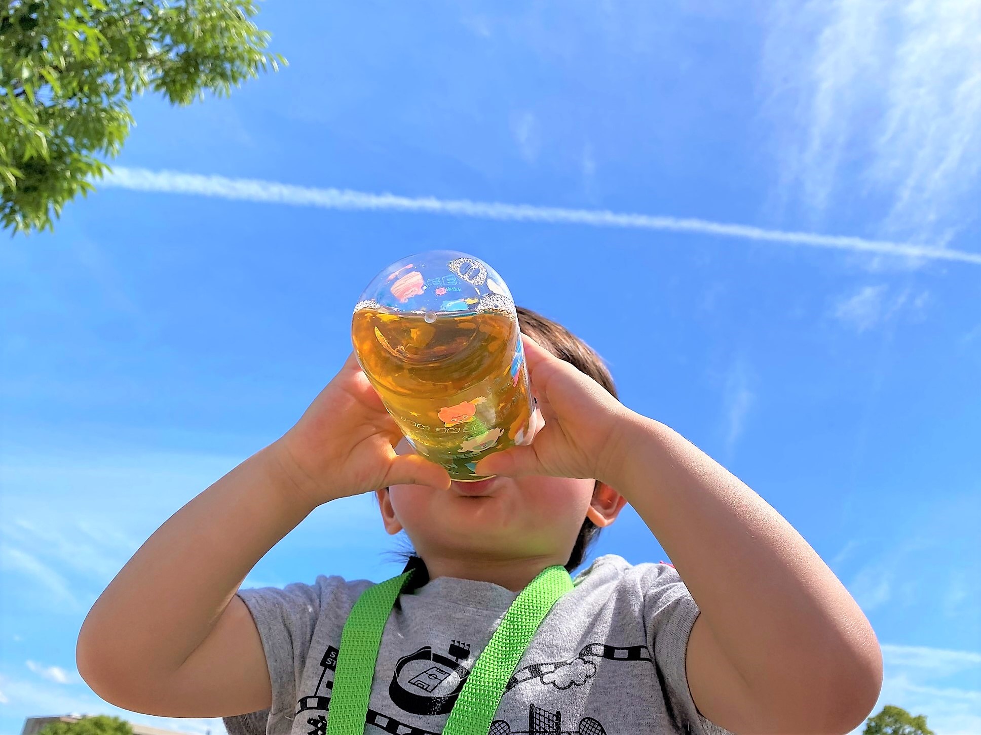 Child drinking in Japan summer heat